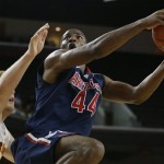 Arizona's Solomon Hill, right, goes up for a basket against Southern California's Zach Banner during the first half of an NCAA college basketball game in Los Angeles, Wednesday, Feb. 27, 2013. (AP Photo/Jae C. Hong)