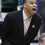 Harvard coach Tommy Amaker shouts to his team in the first half during a third-round game against Arizona in the NCAA men's college basketball tournament in Salt Lake City on Saturday, March 23, 2013. (AP Photo/Rick Bowmer)
