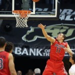 Arizona's Aaron Gordon shoots during the first half of an NCAA college basketball game against Colorado, in Boulder, Colo., Saturday, Feb. 22, 2014. (AP Photo/Brennan Linsley)