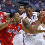 Ohio State's Lenzelle Smith, Jr., right, and Arizona's Mark Lyons (2) vie for possession of the ball during the first half of a West Regional semifinal in the NCAA men's college basketball tournament, Thursday, March 28, 2013, in Los Angeles. (AP Photo/Jae C. Hong)