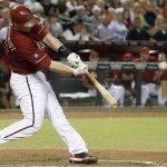 Arizona Diamondbacks' Paul Goldschmidt connects for a two-run home run against the Los Angeles Dodgers in the first inning during a baseball game on Wednesday, Sept. 18, 2013, in Phoenix. (AP Photo/Ross D. Franklin)
