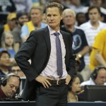 
              Golden State Warriors head coach Steve Kerr watches play against the Memphis Grizzlies in the first half of Game 3 of a second-round NBA basketball Western Conference playoff series Saturday, May 9, 2015, in Memphis, Tenn. (AP Photo/Mark Humphrey)
            