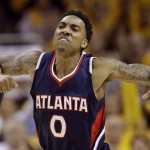 
              Atlanta Hawks' Jeff Teague (0) celebrates after hitting a shot against the Cleveland Cavaliers during the second half in Game 3 of the Eastern Conference finals of the NBA basketball playoffs Sunday, May 24, 2015, in Cleveland. (AP Photo/Tony Dejak)
            