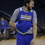 
              Golden State Warriors' Andrew Bogut smiles during NBA basketball practice, Friday, June 5, 2015, in Oakland, Calif. The Golden State Warriors host the Cleveland Cavaliers in Game 2 of the NBA Finals on Sunday. (AP Photo/Ben Margot)
            