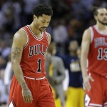 
              Chicago Bulls guard Derrick Rose (1) and teammate Joachim Noah head to the sideline during the second half against the Cleveland Cavaliers in Game 5 in a second-round NBA basketball playoff series Tuesday, May 12, 2015, in Cleveland. (AP Photo/Tony Dejak)
            