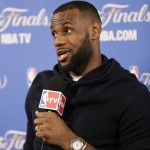 
              Cleveland Cavaliers forward LeBron James answers questions during a news conference after Game 2 of basketball's NBA Finals Sunday, June 7, 2015, in Oakland, Calif. Cleveland won the game in 95-93 in overtime. (AP Photo/Ben Margot)
            
