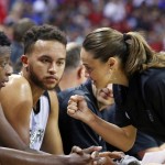 
              From right to left, NBA Summer League head coach Becky Hammon talks with San Antonio's Kyle Anderson and Cady Lalanne during an NBA summer league basketball game against New York, Saturday, July 11, 2015, in Las Vegas. (AP Photo/Ronda Churchill)
            