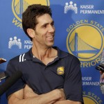 
              Golden State Warriors general manager Bob Myers smiles while speaking to reporters at the team's practice facility in Oakland, Calif., Thursday, June 18, 2015. The Warriors believe their first title in 40 years could be the first of many more. With their young core signed long-term and MVP Stephen Curry just entering his prime, the Warriors are certainly set up to make several championship runs. (AP Photo/Jeff Chiu)
            