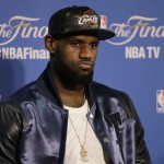 
              Cleveland Cavaliers forward LeBron James speaks at a news conference after Game 5 of basketball's NBA Finals against the Golden State Warriors in Oakland, Calif., Sunday, June 14, 2015. The Warriors won 104-91. (AP Photo/Ben Margot)
            