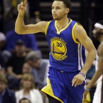
              Golden State Warriors guard Stephen Curry gestures during the second half of Game 6 of a second-round NBA basketball Western Conference playoff series against the Memphis Grizzlies, Friday, May 15, 2015, in Memphis, Tenn. (AP Photo/Mark Humphrey)
            