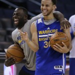 
              Golden State Warriors' Draymond Green, left, and Stephen Curry laugh during NBA basketball practice, Wednesday, June 3, 2015, in Oakland, Calif. The Warriors host the Cleveland Cavaliers in Game 1 of the NBA Finals on Thursday. (AP Photo/Ben Margot)
            