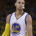 
              Golden State Warriors guard Stephen Curry walks on the court during the first half of Game 5 of the NBA basketball Western Conference finals against the Houston Rockets in Oakland, Calif., Wednesday, May 27, 2015. (AP Photo/Ben Margot)
            