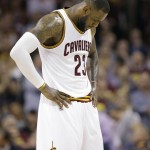 
              Cleveland Cavaliers forward LeBron James (23) hangs his head during the second half of Game 6 of basketball's NBA Finals against the Golden State Warriors in Cleveland, Tuesday, June 16, 2015. (AP Photo/Tony Dejak)
            