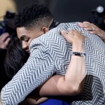 
              Karl-Anthony Towns hugs friends and family after the Minnesota Timberwolves selected him with the first pick during the NBA basketball draft, Thursday, June 25, 2015, in New York. (AP Photo/Kathy Willens)
            