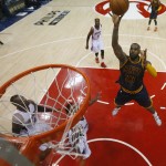 
              Cleveland Cavaliers forward LeBron James (23) shoots against the Atlanta Hawks during the first half in Game 1 of the Eastern Conference finals of the NBA basketball playoffs, Wednesday, May 20, 2015, in Atlanta. (AP Photo/John Bazemore)
            