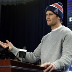               FILE - In this Jan. 22, 2015, file photo, New England Patriots quarterback Tom Brady speaks at a news conference about the NFL investigation into deflated footballs, in Foxborough, Mass. An NFL investigation has found that New England Patriots employees likely deflated footballs and that quarterback Tom Brady was "at least generally aware" of the rules violations. The 243-page report released Wednesday, May 6, 2015, said league investigators found no evidence that coach Bill Belichick and team management knew of the practice. (AP Photo/Elise Amendola, File)
            