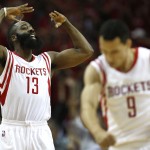 
              Houston Rockets guard James Harden (13) and guard Pablo Prigioni (9) react to a Harden 3-pointer against the Los Angeles Clippers during Game 2 in a second-round NBA basketball playoff series Wednesday, May 6, 2015, in Houston. The Rockets won 115-109. (AP Photo/Houston Chronicle, James Nielsen)
            