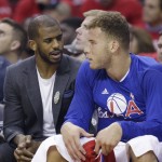 
              Los Angeles Clippers' Chris Paul, left, and Blake Griffin sit on the bench during the first half of Game 2 in a second-round NBA basketball playoff series against the Houston Rockets, Wednesday, May 6, 2015, in Houston. Paul is out for Game 2 with a strained left hamstring. (AP Photo/David J. Phillip)
            