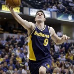 
              FILE- In this Feb. 4, 2015, file photo, Indiana Pacers' Damjan Rudez puts up shot during the second half of an NBA basketball game against the Detroit Pistons in Indianapolis. Rudez is impressed with the growth he’s seeing in European basketball. Recently, the Croatian native who attended a Basketball Without Borders camp more than a decade ago returned to his home country to work with another batch of potential stars and couldn’t believe the changes. (AP Photo/Darron Cummings, File)
            
