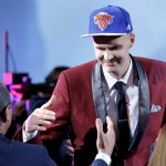 
              Kristaps Porzingis is congratulated by supporters after being selected fourth overall by the New York Knicks during the NBA basketball draft, Thursday, June 25, 2015, in New York. (AP Photo/Kathy Willens)
            