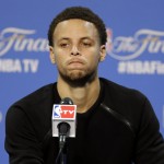 
              Golden State Warriors guard Stephen Curry (30) listens to question during a press conference following Game 3 of basketball's NBA Finals against the Cleveland Cavaliers in Cleveland, Wednesday, June 10, 2015. The Cavaliers defeated the Warriors 96-91. (AP Photo/Tony Dejak)
            