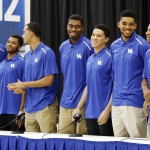 
              FILE - In this April 9, 2015, file photo, Kentucky NCAA college basketball players, from left, Willie Cauley-Stein, Andrew Harrison, Trey Lyles, Dakari Johnson, Devon Booker, Karl-Anthony Towns and Aaron Harrison stand during a news conference at the Joe Craft Center in Lexington, Ky., where they announced their intent to enter the NBA draft (AP Photo/James Crisp, File)
            