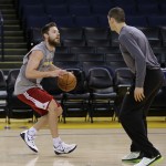 
              Cleveland Cavaliers' Matthew Dellavedova, left, works during NBA basketball practice on Friday, June 5, 2015, in Oakland, Calif. The Golden State Warriors host the Cavaliers in Game 2 of the NBA Finals on Sunday. (AP Photo/Ben Margot)
            