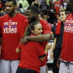 
              San Antonio Spurs coach Becky Hammon hugs Jonathan Simmons after they defeated Phoenix Suns in an NBA summer league championship basketball game Monday, July 20, 2015, in Las Vegas. (AP Photo/John Locher)
            