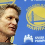 
              Golden State Warriors head coach Steve Kerr speaks to reporters at the team's practice facility in Oakland, Calif., Thursday, June 18, 2015. The Warriors believe their first title in 40 years could be the first of many more. With their young core signed long-term and MVP Stephen Curry just entering his prime, the Warriors are certainly set up to make several championship runs. (AP Photo/Jeff Chiu)
            