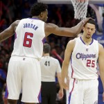 
              Los Angeles Clippers center DeAndre Jordan, left, celebrates with guard Austin Rivers during the second half of Game 3 in a second-round NBA basketball playoff series against the Houston Rockets, Friday, May 8, 2015, in Los Angeles. (AP Photo/Jae C. Hong)
            