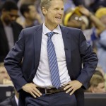 
              Golden State Warriors coach Steve Kerr smiles during the second half of Game 6 of a second-round NBA basketball Western Conference playoff series against the Memphis Grizzlies,  Friday, May 15, 2015, in Memphis, Tenn. (AP Photo/Mark Humphrey)
            