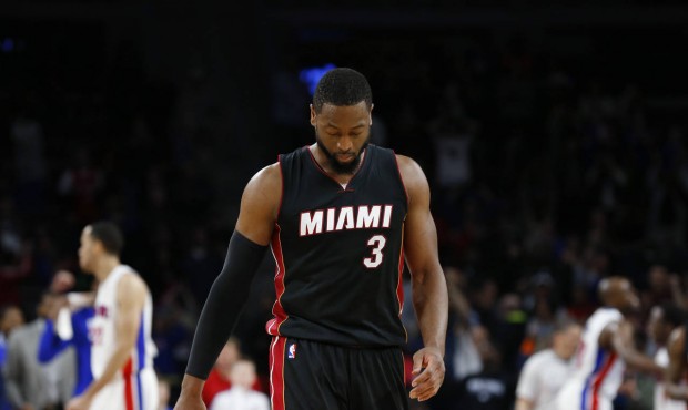 n FILE – In this April, 2015 file photo, Miami Heat guard Dwyane Wade walks off the court aft...