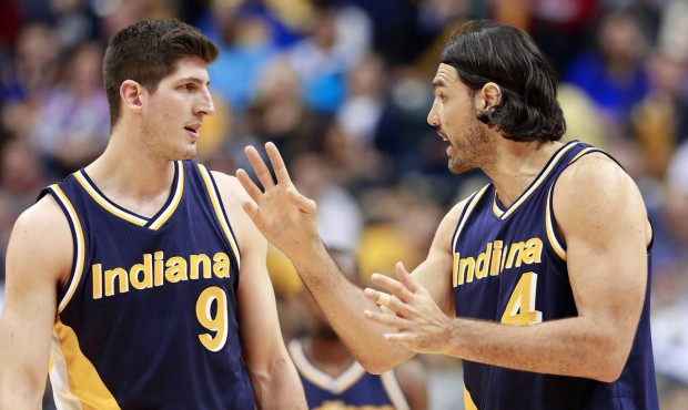 FILE – In this Feb. 22, 2015, file photo, Indiana Pacers forwards Damjan Rudez (9) and Luis S...