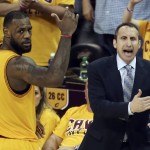 
              FILE - In this May 24, 2015, file photo, Cleveland Cavaliers head coach David Blatt yells at his team as LeBron James (23) looks on during overtime of Game 3 of the Eastern Conference finals of the NBA basketball playoffs against the Atlanta Hawks in Cleveland. Blatt was handed a star-studded team expected to win an NBA title, but not a handbook on how to get the Cavaliers to the top. For Blatt, who left his family in Israel to pursue his dream, the journey has been difficult with speculation about his future partly undermining his success. (AP Photo/Ron Schwane, File)
            