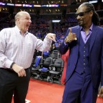 
              Los Angeles Clippers owner Steve Ballmer, left, chats with entertainer Snoop Dogg before Game 3 in a second-round NBA basketball playoff series between the Los Angeles Clippers and the Houston Rockets in Los Angeles, Friday, May 8, 2015. (AP Photo/Jae C. Hong)
            