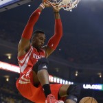
              Houston Rockets' Dwight Howard scores against the Golden State Warriors during the first quarter of Game 1 of the NBA basketball Western Conference fnals Tuesday, May 19, 2015, in Oakland, Calif. (AP Photo/Ben Margot)
            