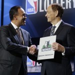 
              NBA Deputy Commissioner Mark Tatum, left, congratulates Minnesota Timberwolves owner Glen Taylor after the Timberwolves won the first pick in the draft, during the NBA basekball draft lottery, Tuesday, May 19, 2015, in New York. (AP Photo/Julie Jacobson)
            