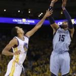 
              Memphis Grizzlies guard Vince Carter (15) shoots over Golden State Warriors guard Shaun Livingston during the first half of Game 5 in a second-round NBA playoff basketball series in Oakland, Calif., Wednesday, May 13, 2015. (AP Photo/Ben Margot)
            