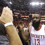 
              Houston Rockets' James Harden (13) celebrates after defeating the Los Angeles Clippers 113-100 in Game 7 of the NBA basketball Western Conference semifinals, Sunday, May 17, 2015, in Houston. (AP Photo/David J. Phillip)
            