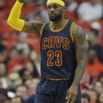 
              Cleveland Cavaliers forward LeBron James signals to teammates during the first half of Game 3 in a second-round NBA basketball playoff series against the Chicago Bulls, in Chicago on Friday, May 8, 2015. (AP Photo/Nam Y. Huh)
            