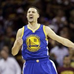 
              Golden State Warriors guard Klay Thompson (11) reacts during the second half of Game 6 of basketball's NBA Finals against the Cleveland Cavaliers in Cleveland, Tuesday, June 16, 2015. (AP Photo/Tony Dejak)
            