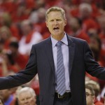 
              Golden State Warriors head coach Steve Kerr gestures during the first half in Game 4 of the NBA basketball Western Conference finals against the Houston Rockets Monday, May 25, 2015, in Houston. (AP Photo/David J. Phillip)
            