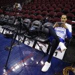 
              Golden State Warriors guard Shaun Livingston checks his phone before practice for basketball's NBA Finals in Cleveland, Wednesday, June 10, 2015. The Cleveland Cavaliers lead the Warriors 2-1 in the best-of-seven games series.  Game 4 is scheduled for Thursday. (AP Photo/Paul Sancya)
            