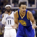 
              Golden State Warriors guard Stephen Curry (30) gestures as Memphis Grizzlies guard Mike Conley (11) walks behind during the second half of Game 6 of a second-round NBA basketball Western Conference playoff series Friday, May 15, 2015, in Memphis, Tenn. (AP Photo/Mark Humphrey)
            