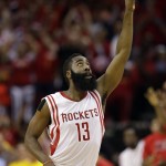 
              Houston Rockets' James Harden (13) reacts after hitting a three-point shot during the second half of Game 5 in the first round of the NBA basketball playoffs against the Dallas Mavericks, Tuesday, April 28, 2015, in Houston. (AP Photo/David J. Phillip)
            