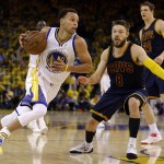 
              Golden State Warriors guard Stephen Curry (30) drives on Cleveland Cavaliers guard Matthew Dellavedova (8) during the second half of Game 2 of basketball's NBA Finals in Oakland, Calif., Sunday, June 7, 2015. (AP Photo/Ben Margot)
            