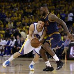 
              Golden State Warriors guard Klay Thompson, left, is guarded by Cleveland Cavaliers forward LeBron James during the second half of Game 2 of basketball's NBA Finals in Oakland, Calif., Sunday, June 7, 2015. (AP Photo/Ben Margot)
            
