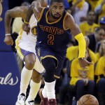 
              Cleveland Cavaliers guard Kyrie Irving (2) dribbles against the Golden State Warriors during the first half of Game 1 of basketball's NBA Finals in Oakland, Calif., Thursday, June 4, 2015. (AP Photo/Ben Margot)
            