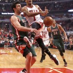 
              Chicago Bulls guard Derrick Rose (1) reacts after Milwaukee Bucks center Zaza Pachulia stripped the ball from Rose during the first half in Game 5 of the NBA basketball playoffs Monday, April 27, 2015, in Chicago. (AP Photo/Charles Rex Arbogast)
            