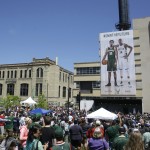 
              Milwaukee Bucks' fans gather around a stage at a summer block party Saturday, June 6, 2015, in Milwaukee. (AP Photo/Aaron Gash)
            